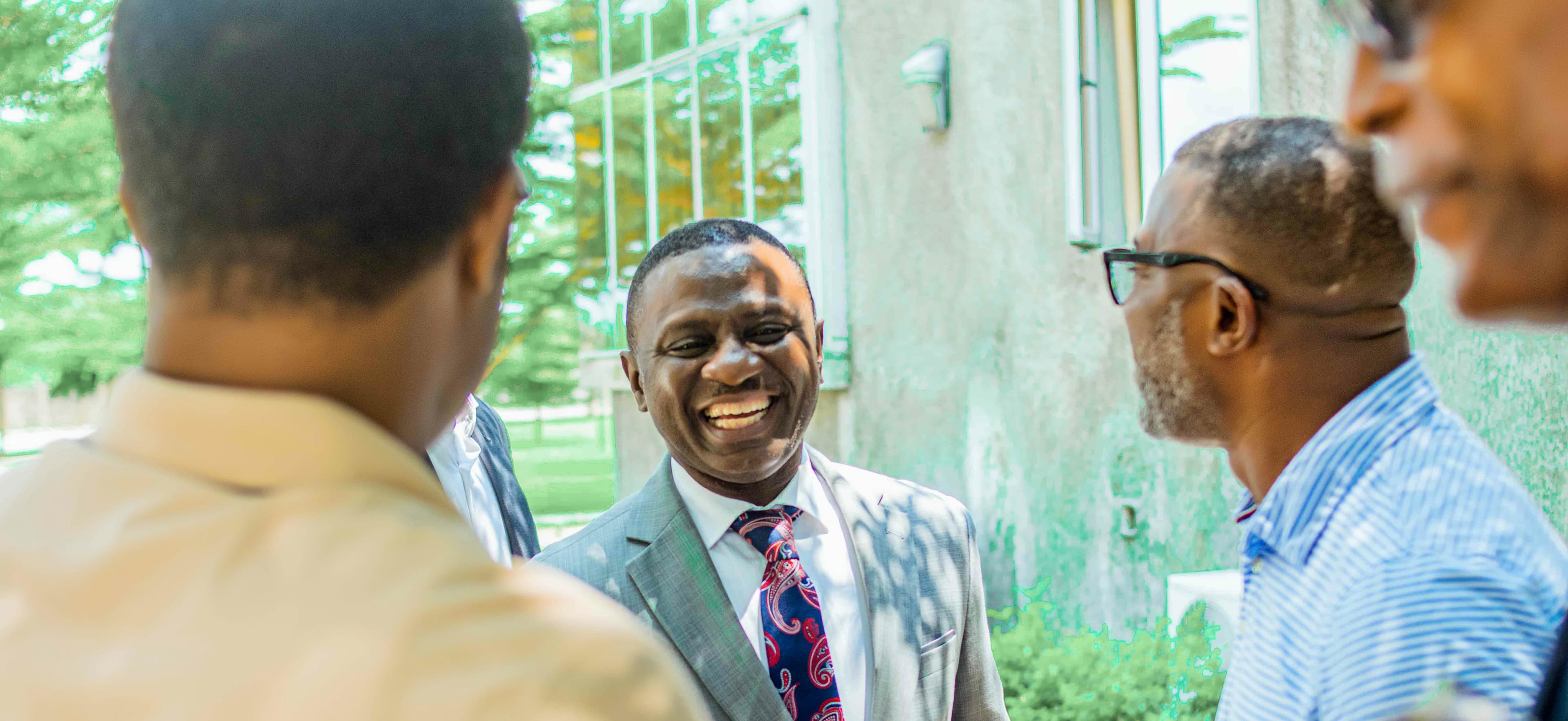 image of men smiling